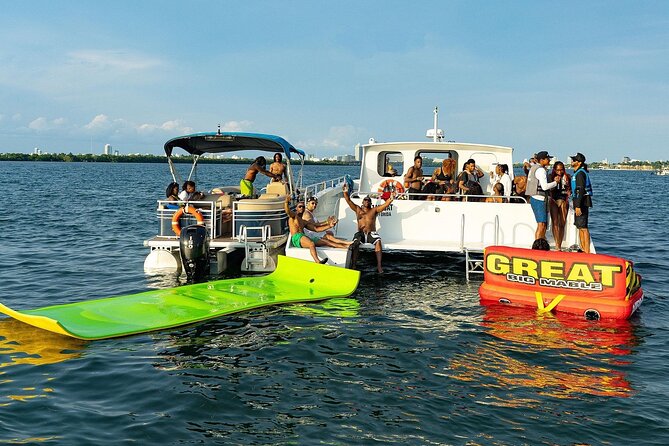 3 Hour Party Boat Jet ski Banana Tube and open bar in Miami - Floating mats, swim time, and the comfort side of the bay