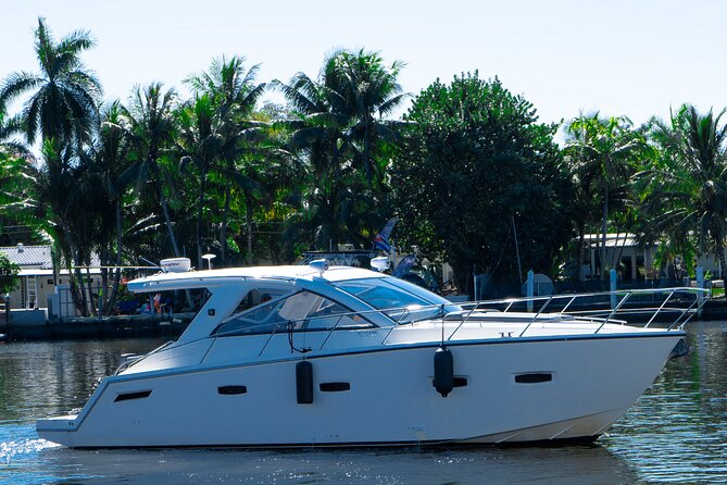 40' Sealine Cruise with Captain and Stew - The yacht setup: convertible roof, clean interior feel, and a swim-friendly platform