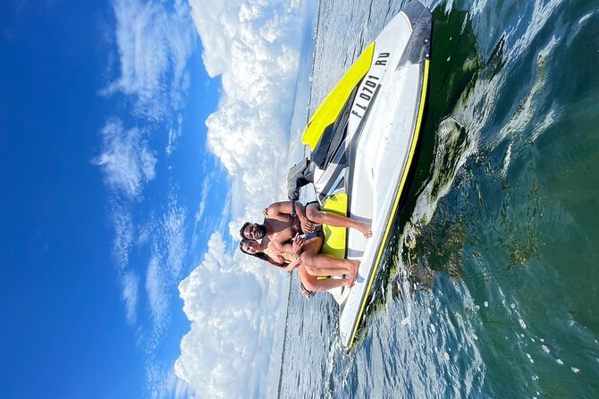 AquaFusion Combo: Jet Ski + Party Boat Excursion - Jet ski time plus coastline play: how to maximize your ride