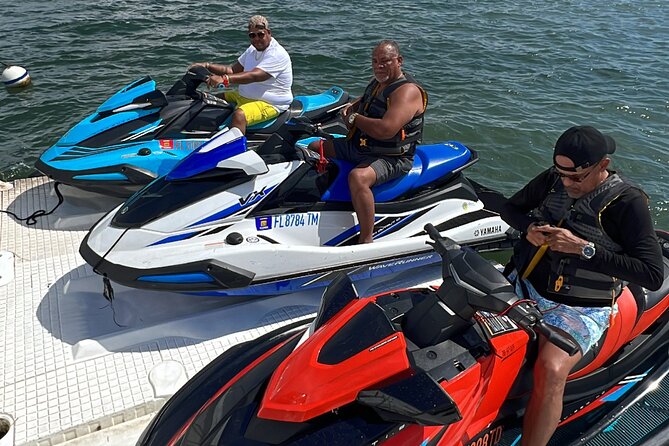 Aquatic Adventure: Boat Tour with Jetskis, Tubing, and Open Bar - 360 tubing and water mat: the “group fun” option