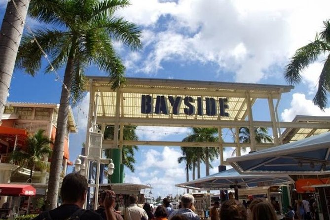 Biscayne Bay Boat Tour in Miami - Onboard basics: beer or water, restrooms, deck seating, and bilingual narration