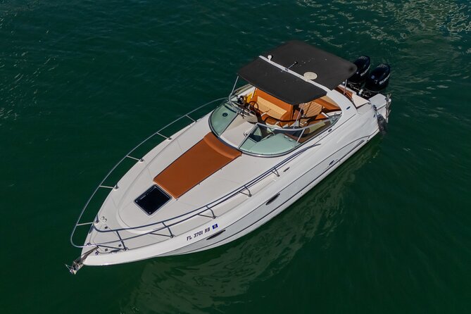 Explore Miami in Style: Private Boat Cruise Tour with Captain - Miami Heat arena from the water: sports energy, different angles