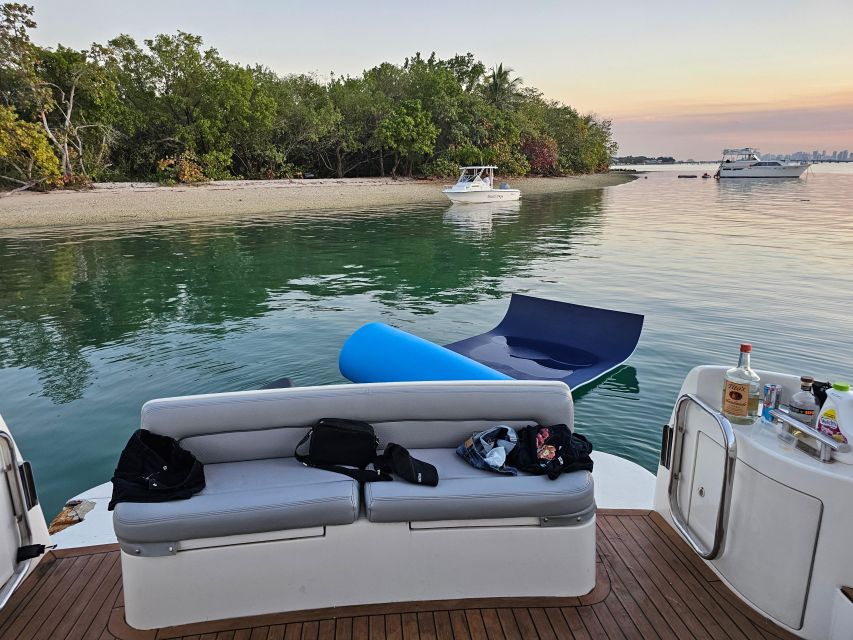From North Bay Village: Private Boat Party with Champagne - Millionaires Row Cruise: Star Island, Porsche Tower, and Fendi