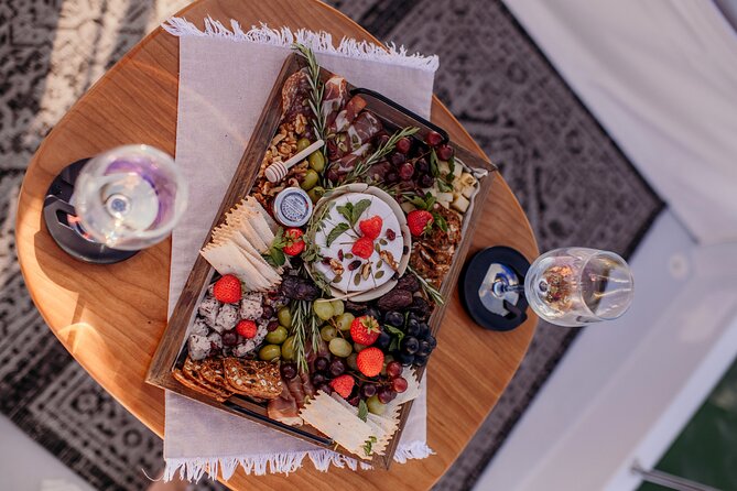 Luxury Shared Miami River E-Boat Cruise with Wine and Charcuterie - Captain energy and music: how the vibe really lands