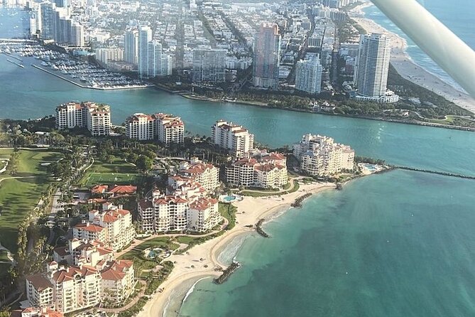 Miami Beach: Luxury Plane Tour with Free Champagne - Fisher Island from the sky: shoreline details without the ground traffic