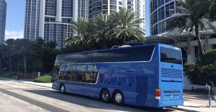 Miami & Key West: One-Way Transfer by Motor Coach Bus - Meeting at Bayside Marketplace and settling into the double-decker coach