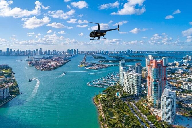 Miami Top-Rated Helicopter Tour: South Beach, Downtown & Islands - Entering the flight: from Miami Executive Airport to the bay