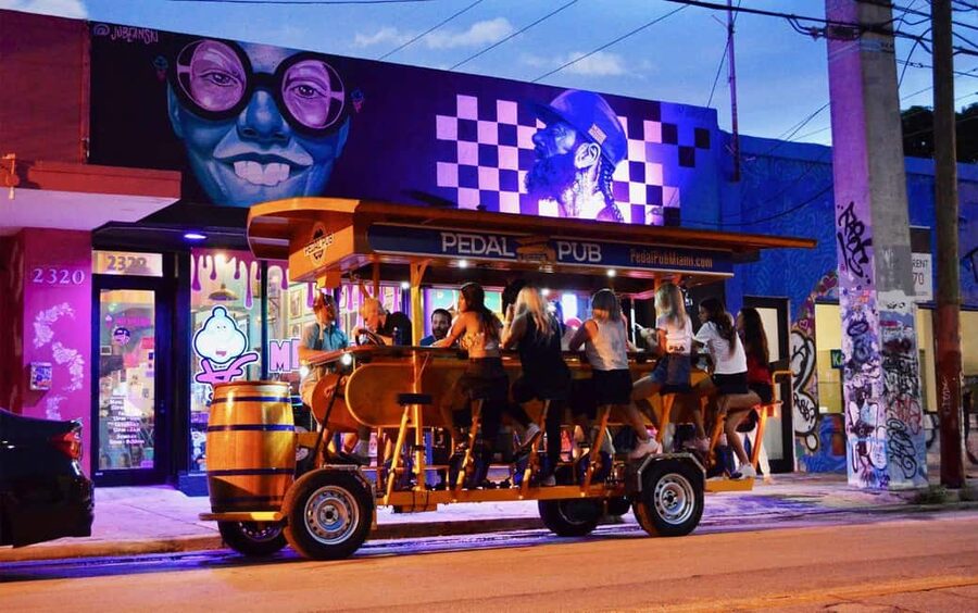 Pedal Pub Miami: Art District Party Bike Pub Crawl - Meeting at Astra: A Pink Start with a Rooftop Bar