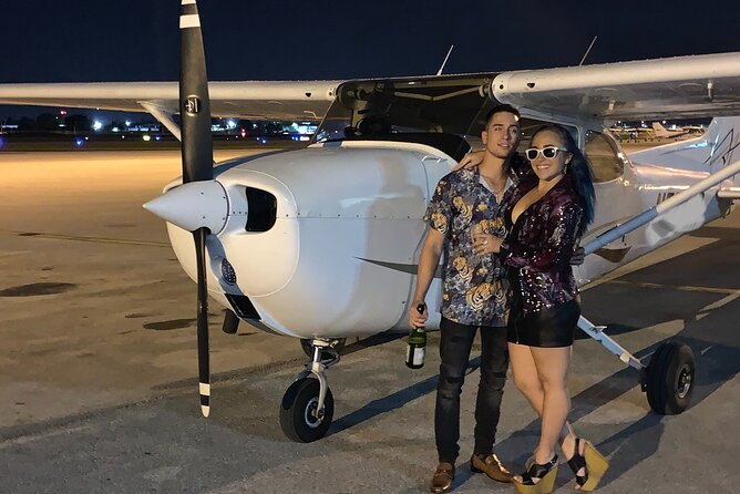 Private 60 Minute Romantic Air Tour with Champagne in Miami - The champagne toast: a romantic touch with a practical twist