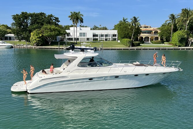 The BIG Sundancer Rental in Miami Beach - Getting comfortable on the Sea Ray 540: cabins, bathrooms, shade, and a swim deck