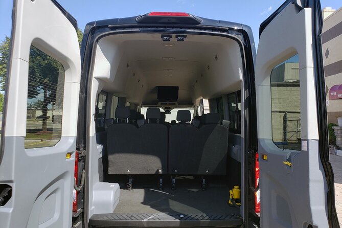 VAN Mia Airport or Hotels to Miami Port or Hotels Up to 14pax - Pickup at Miami Airport: call, then call again (and know your door)